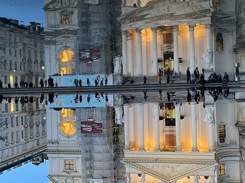 Reflection of the Karlskirche, Vienna (Austria), in a Small pond. The Picture is turned upside down.