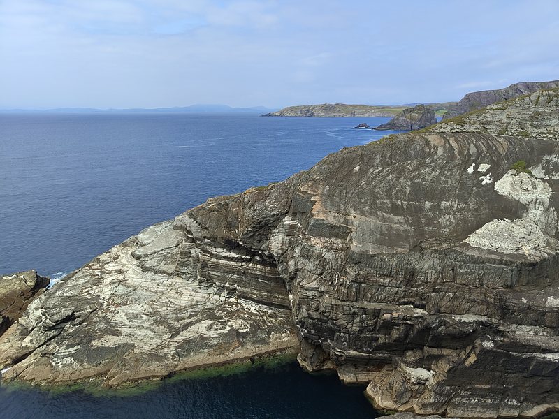 Bare, craggy outcrops reaching into the Atlantic Ocean like claws or gigantic whales