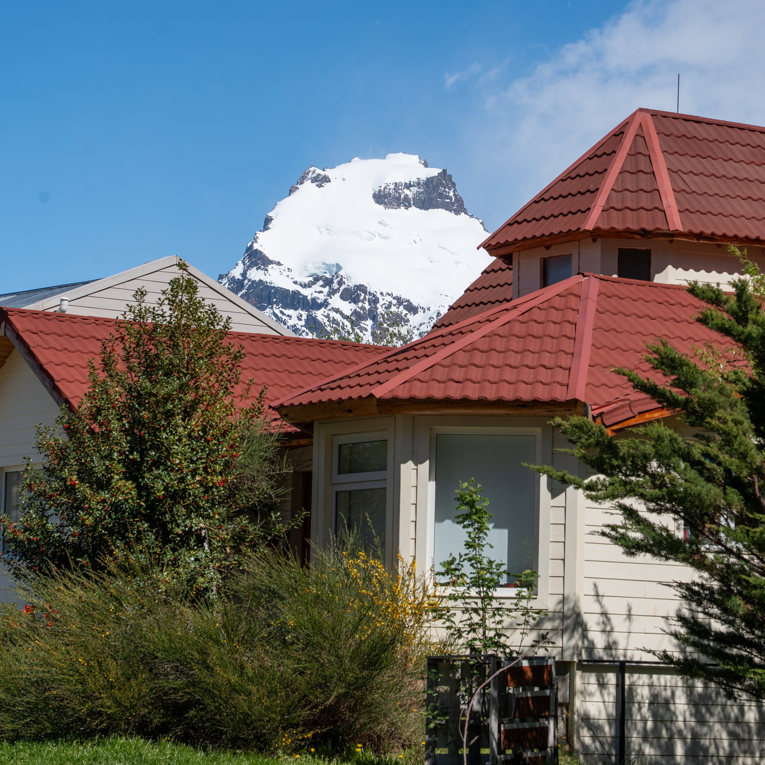 house with mountain behind