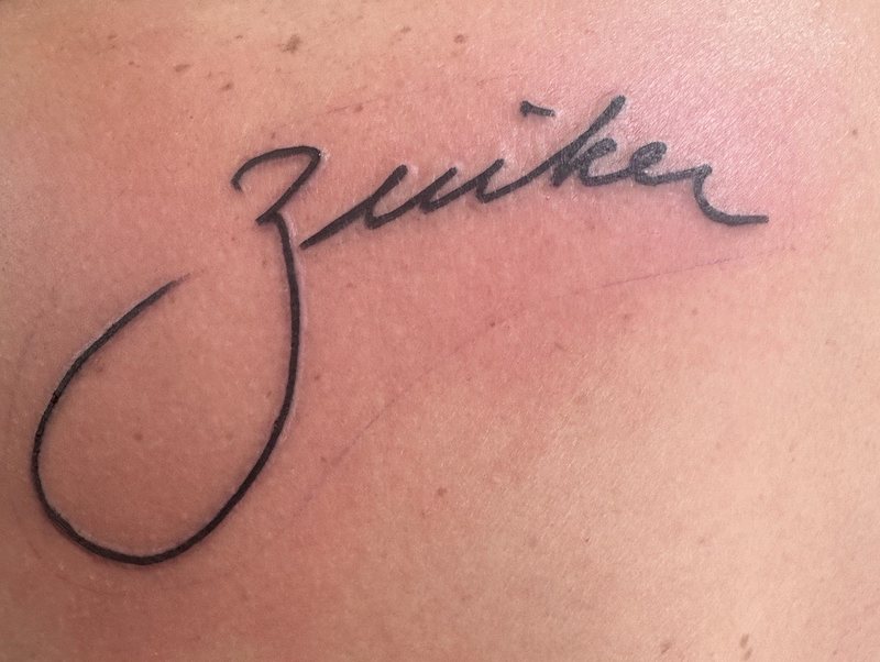 a Zuiker tattoo based on his grandfather's signature.