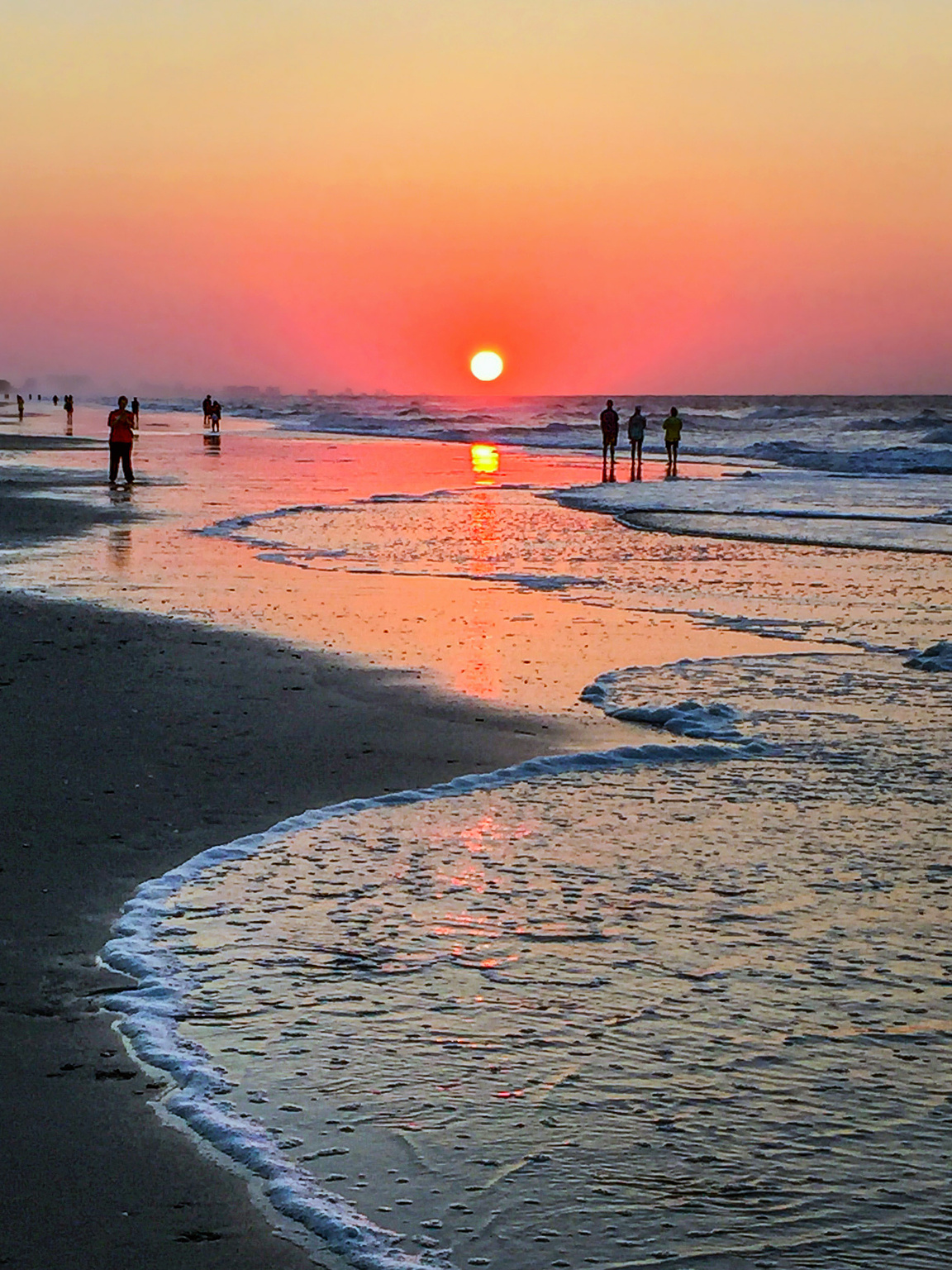 Enjoying a beautiful sunset at Myrtle Beach, SC, during a family vacation in 2016. 