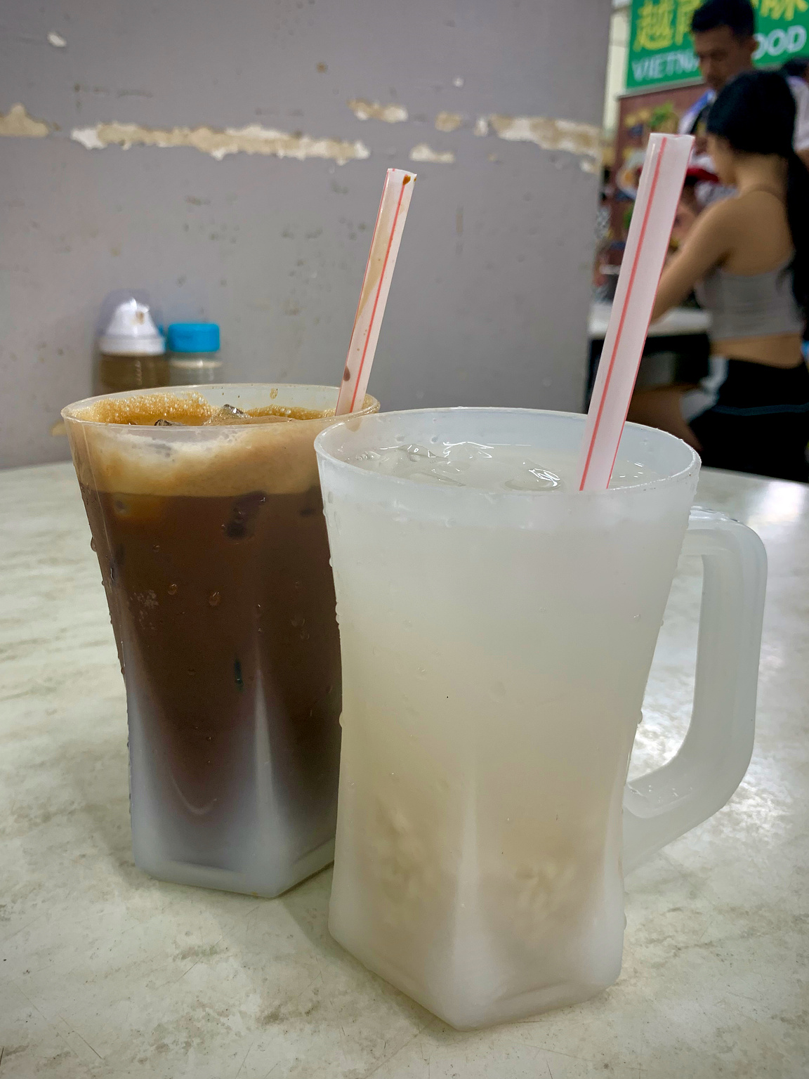 Two cups of drinks - Cold coffee and Iced Barley Water