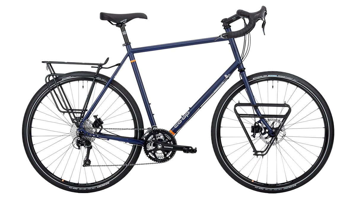 Product photo of a blue, drop-bar touring bike with front and rear cargo racks