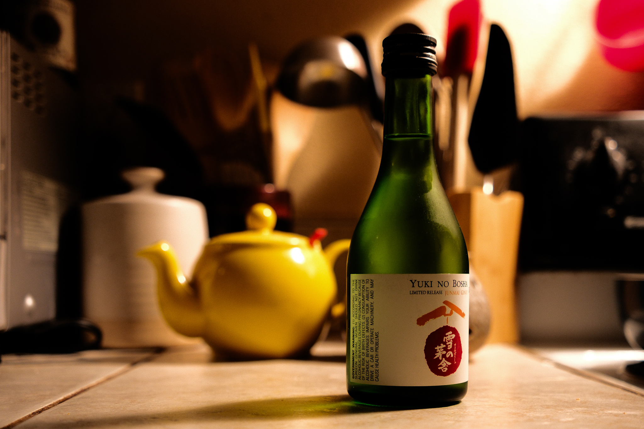 A green sake bottle