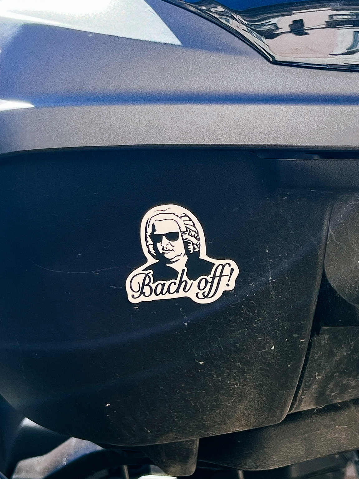 "Bach off!", and an image of Bach. 