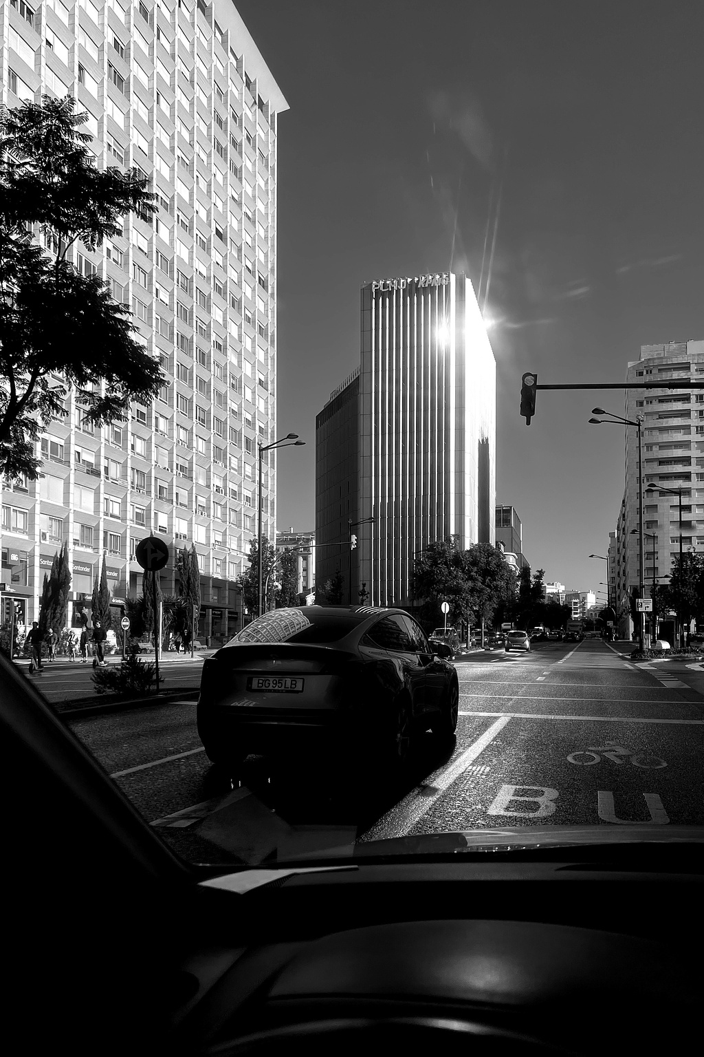 Buildings, and a car.