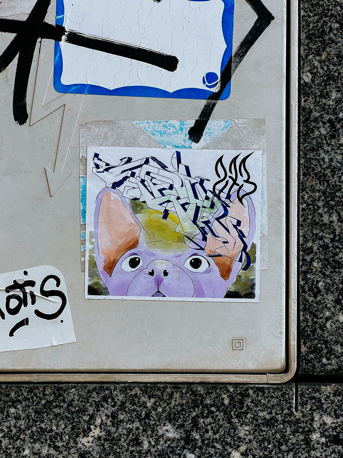 A puzzled looking animal, with graffitied characters over its head.