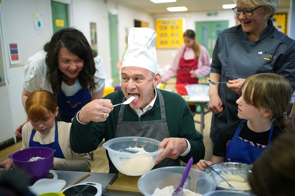 Ed Davey eating a cake