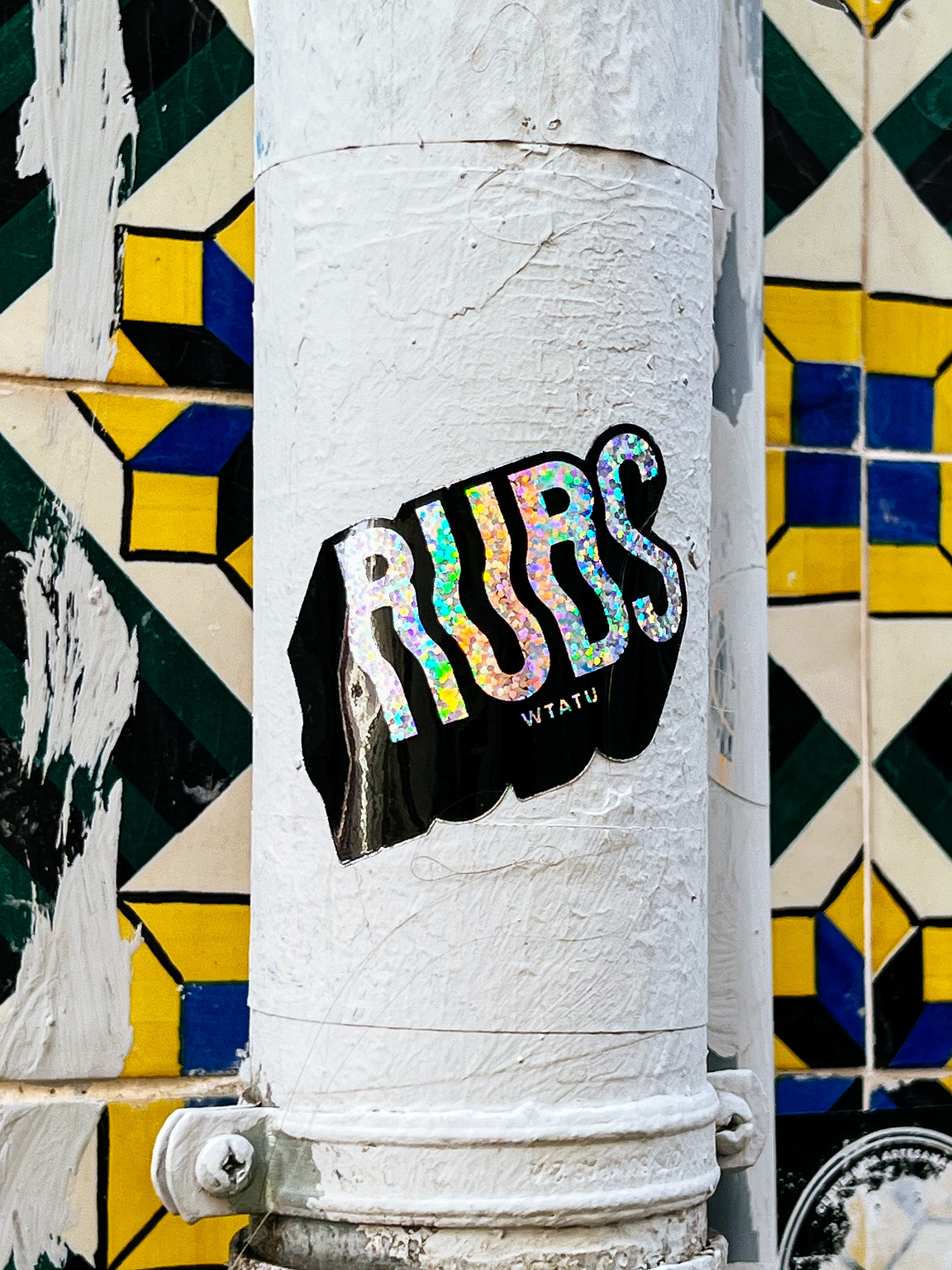 "RUBS", in sparkly characters. 