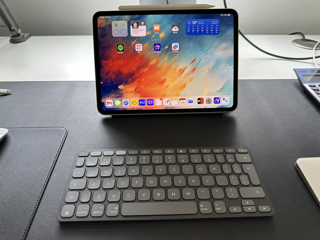 iPad pro on a desk with Logitech Keys To Go 2 keyboard. 