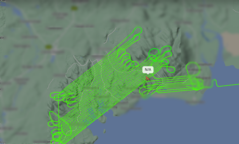 Flight path of a low flying aircraft sweeping back and forth across a small area