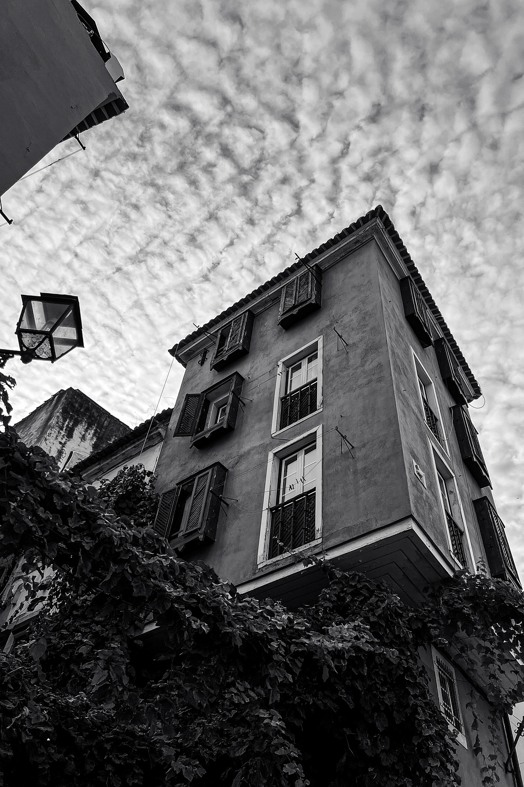 Classic Lisbon building. Cloudy sky. 