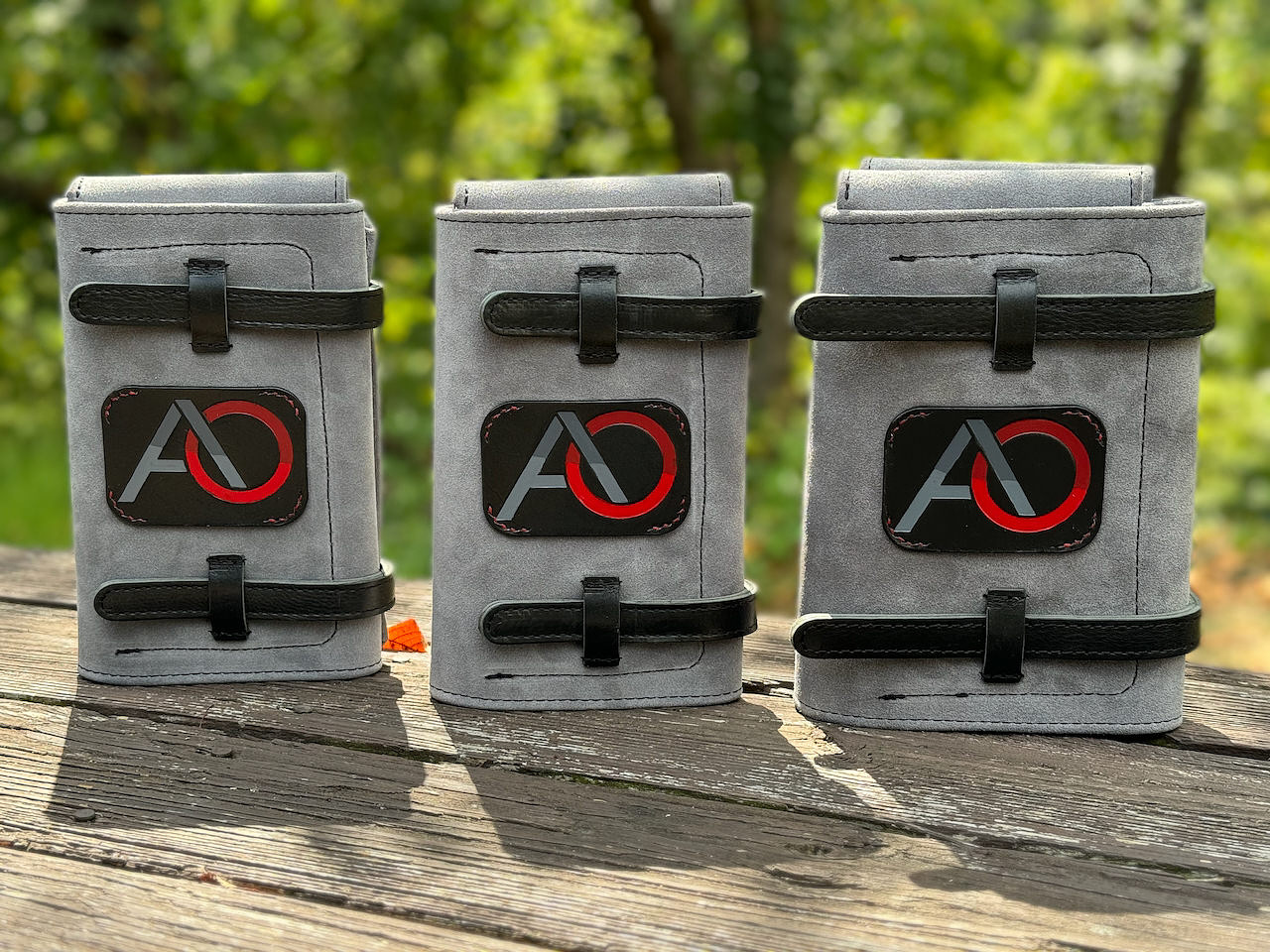 cigars cases in suede, with hand-painted logos