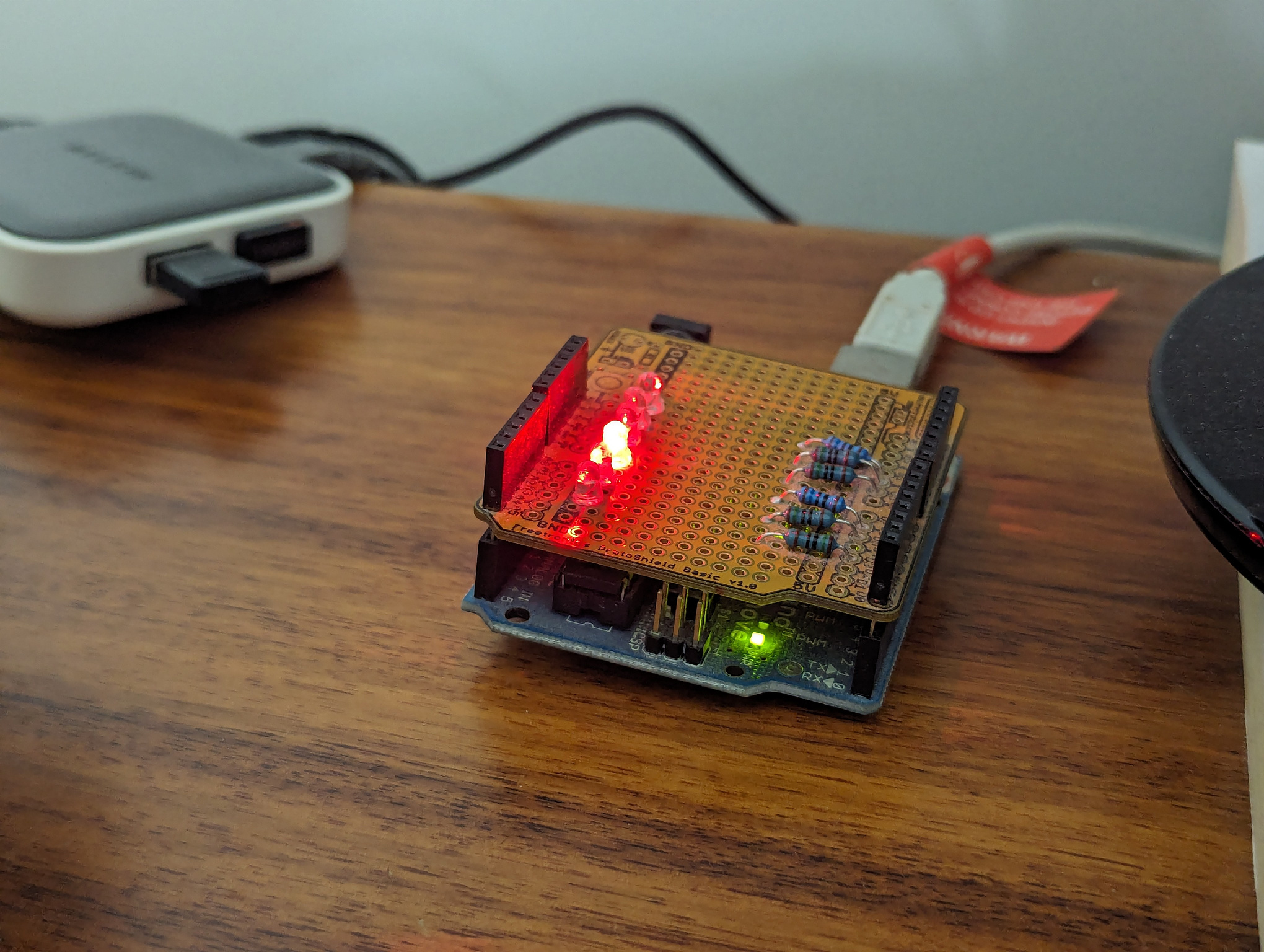 The red LED, indicating a failed build.