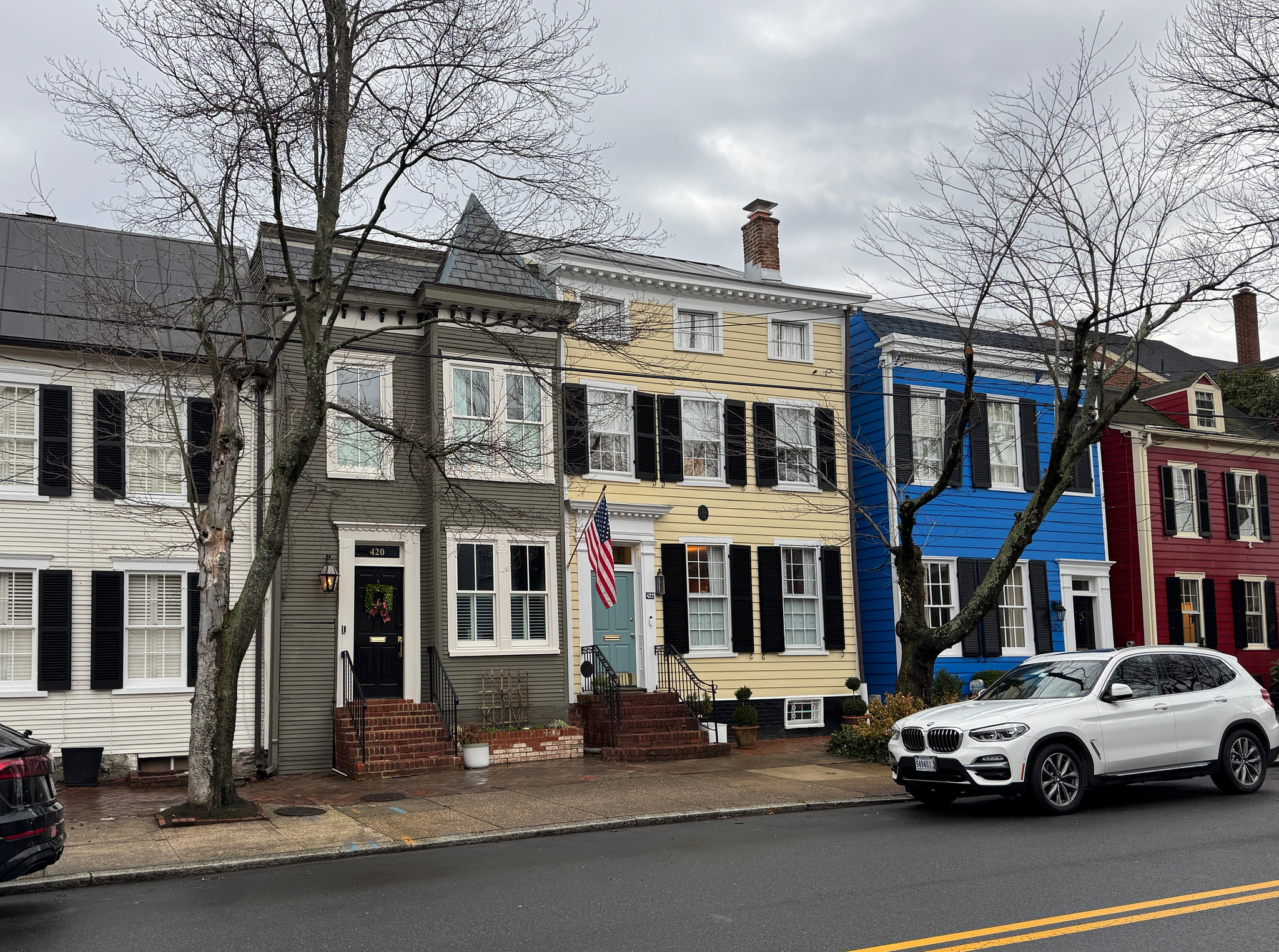 row of colorful, historic townhomes