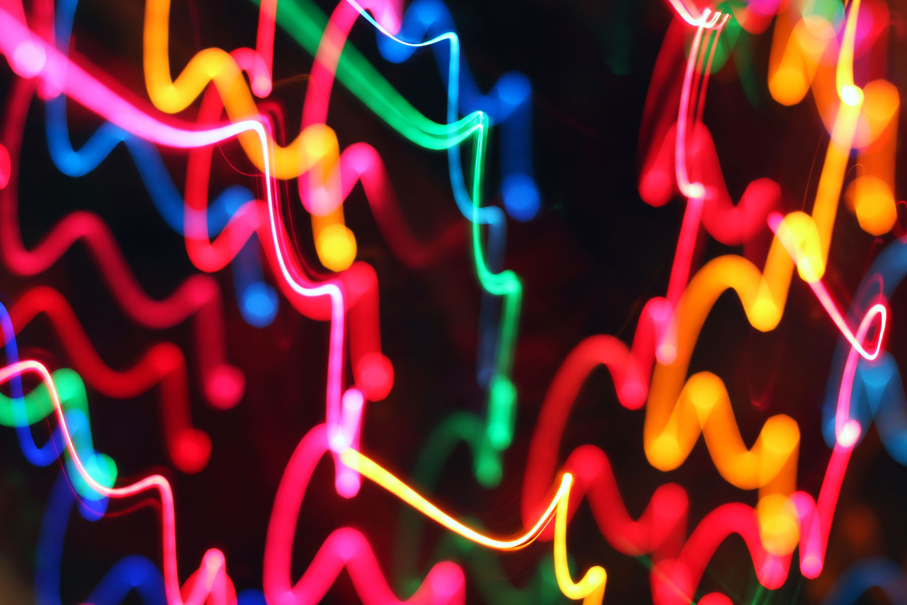 Swirls of colorful lights captured using slow shutter speed.