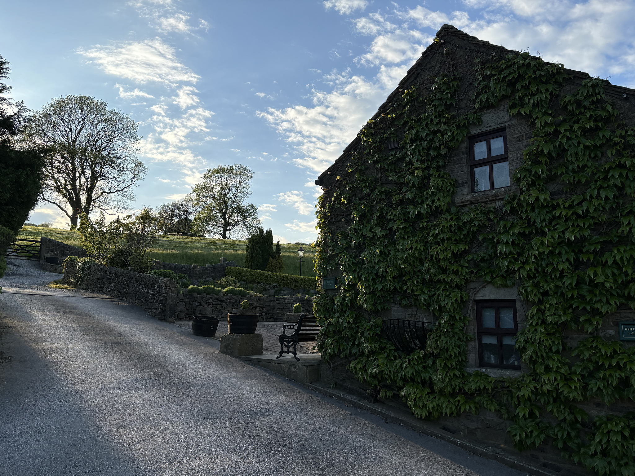 The side of the pub leads to a picturesque beer garden and BBQ.