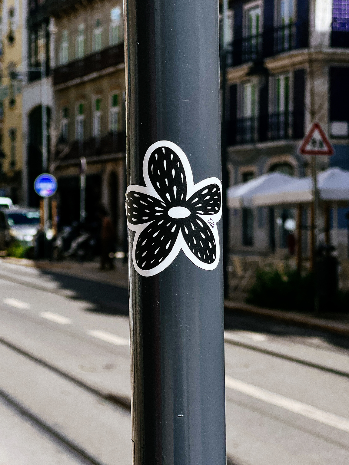 A flower, a sticker. 