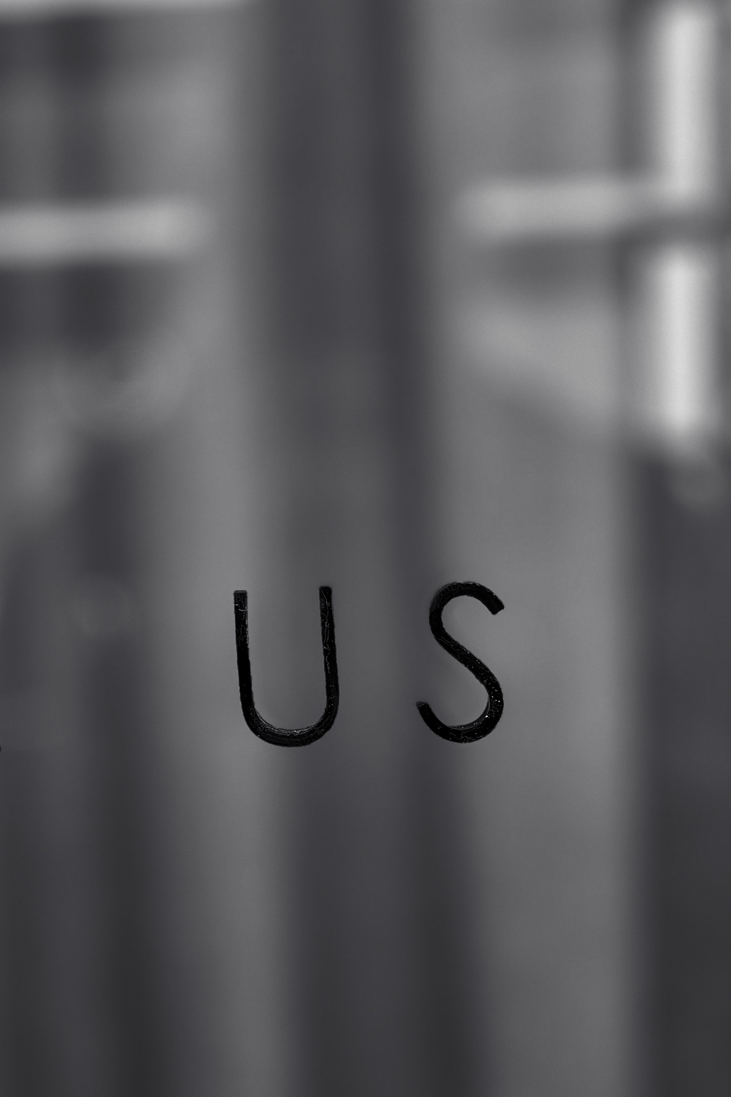 "US" on a window. 