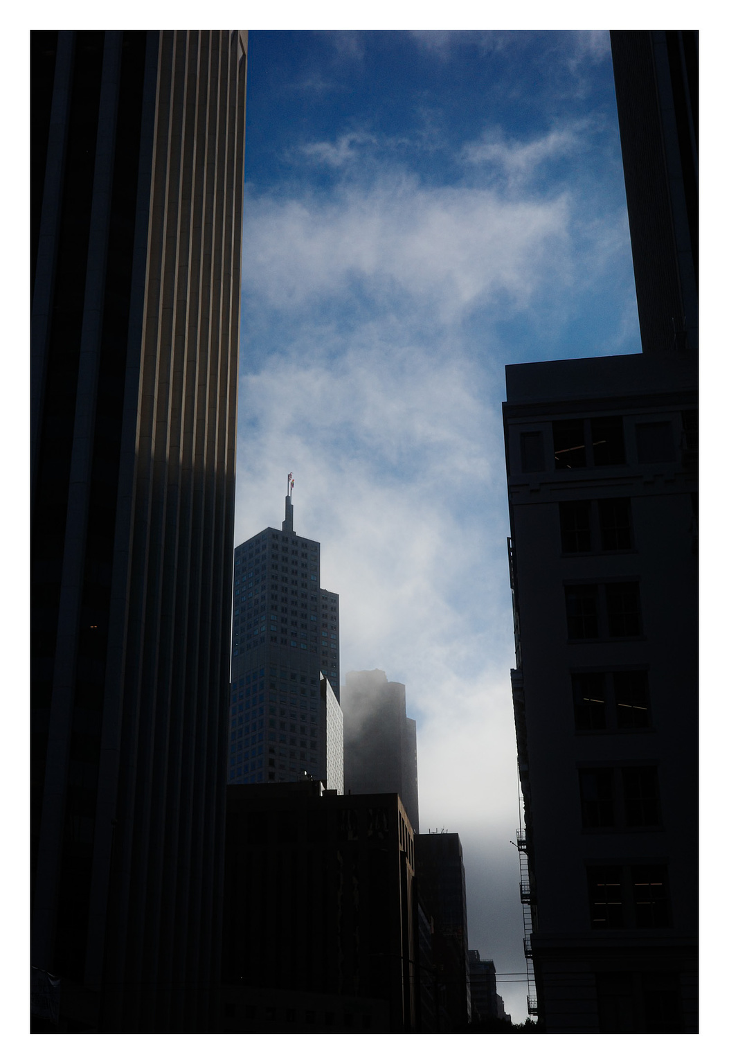 Clouds and fog in an urban canyon