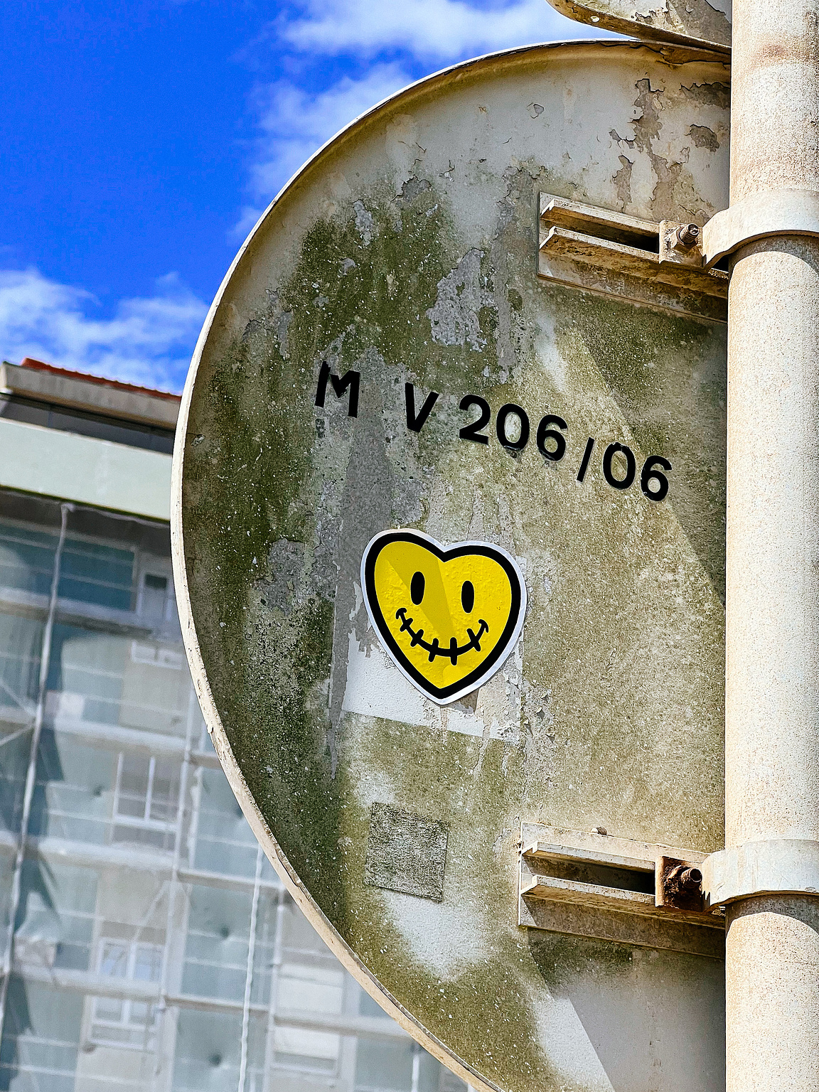 A smiling heart sticker. 