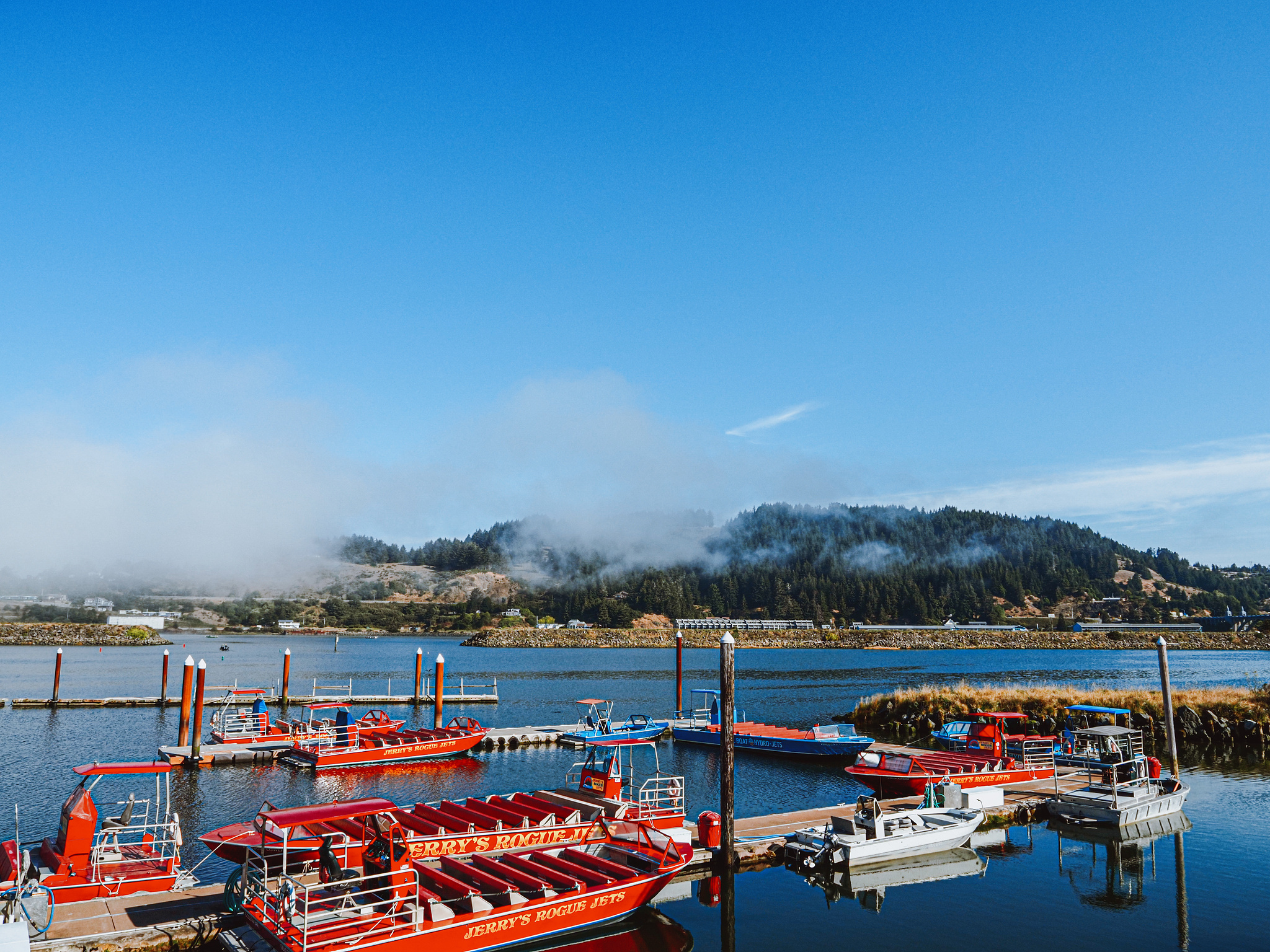 Bright red jet boats on the Rogue River