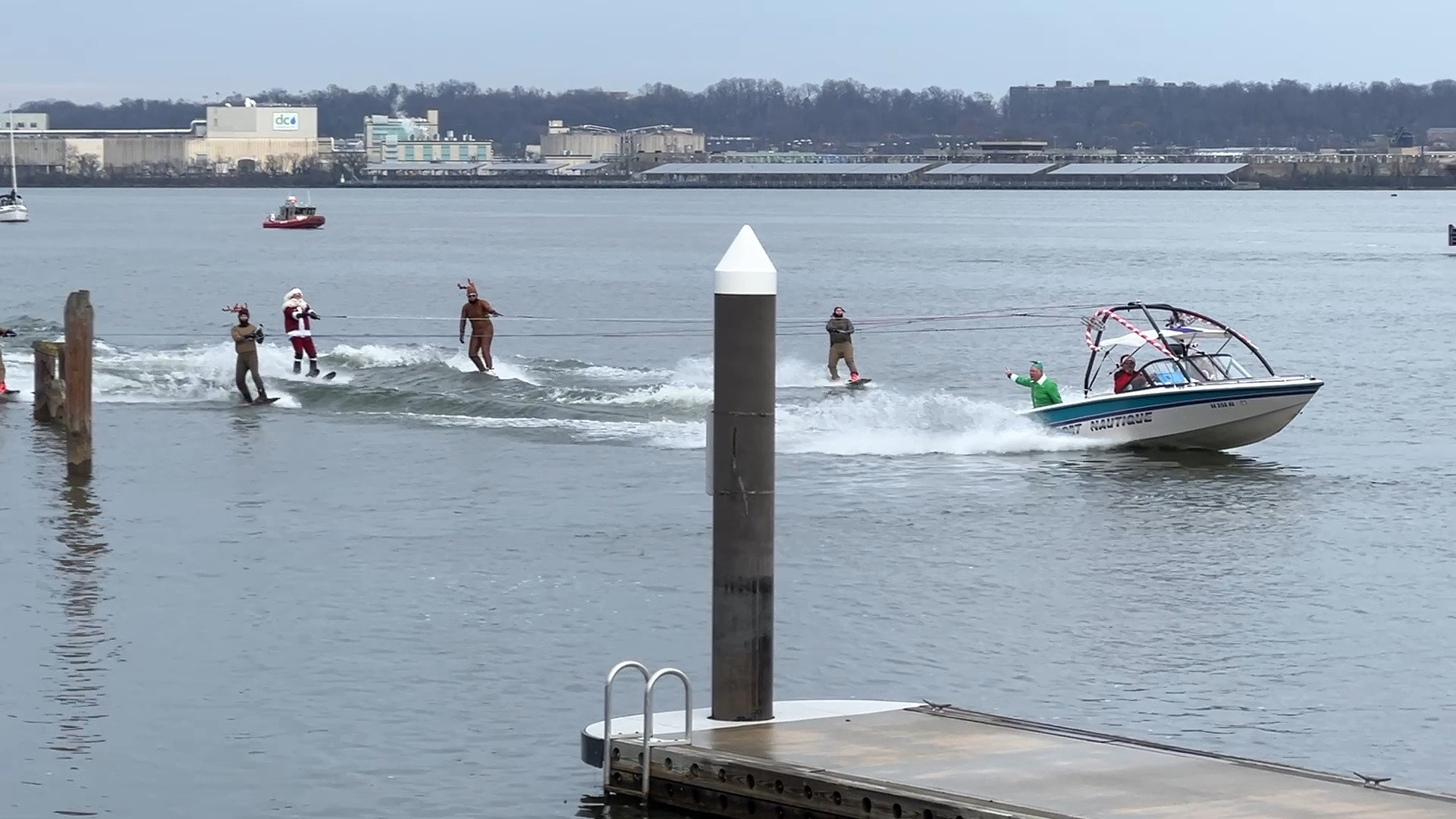 Santa and his reindeer on water skis