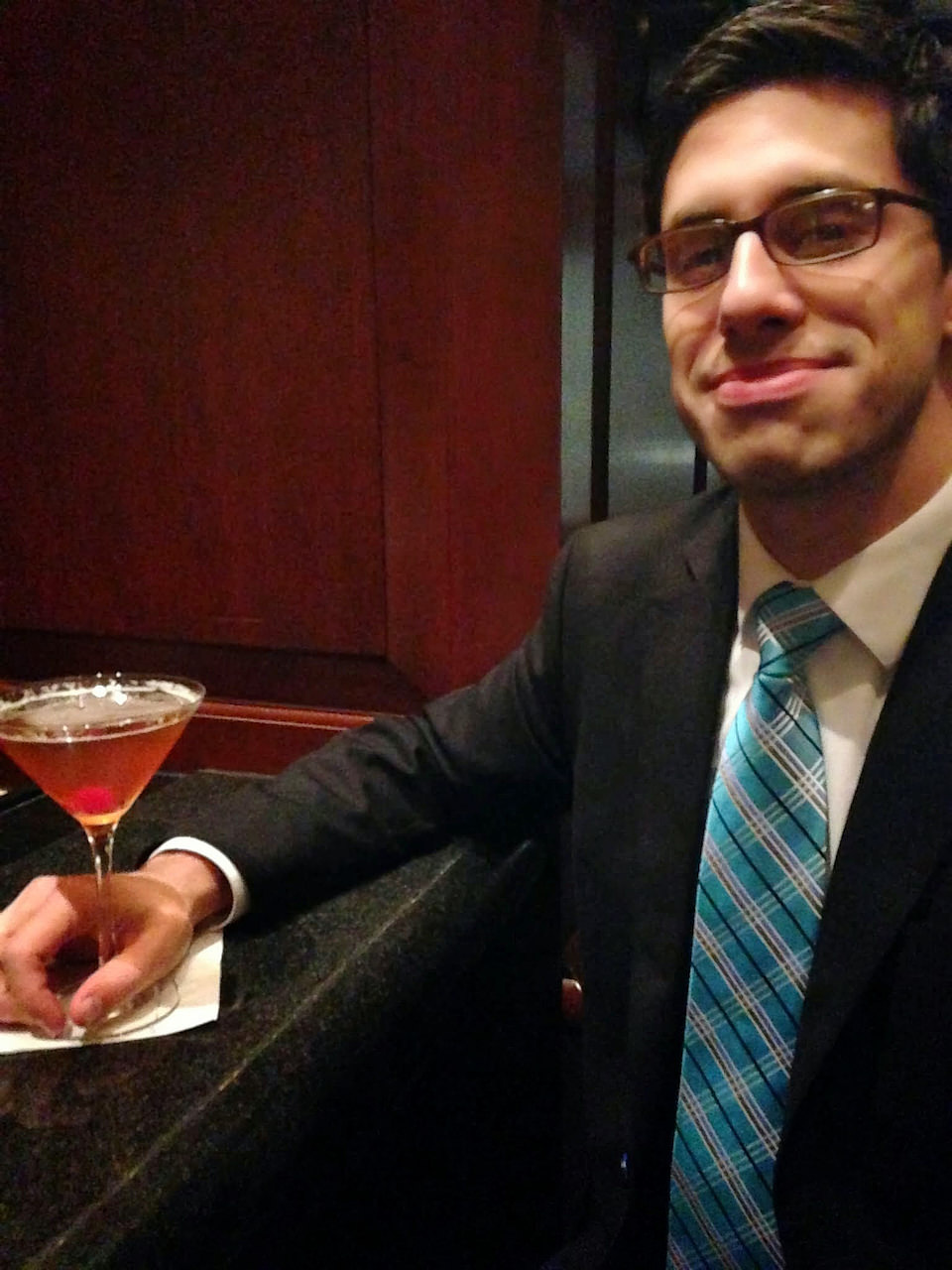 me in 2013, enjoying a Manhattan in my favorite hotel lounge.